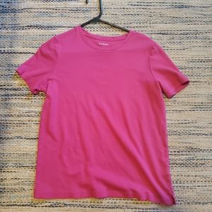 Kim Roger's bright pink shirt